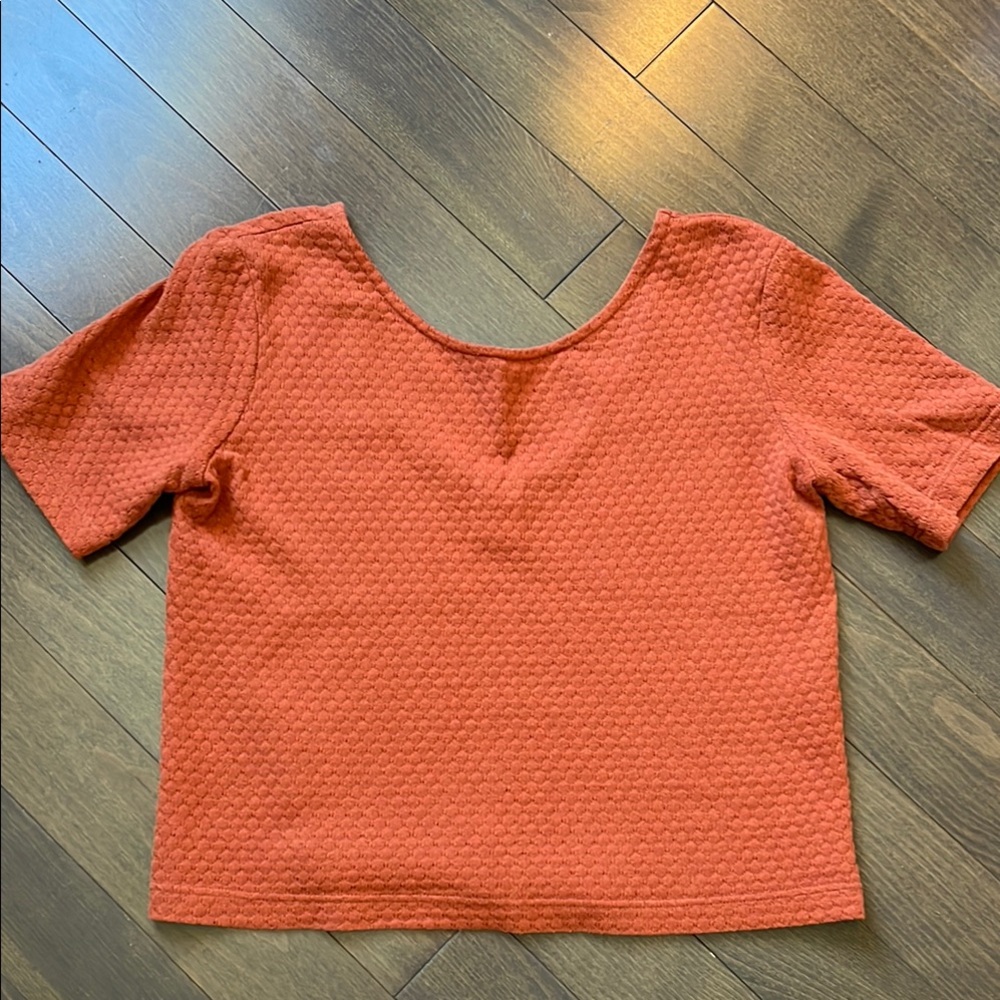 Ève Gravel burnt orange cotton knit Top